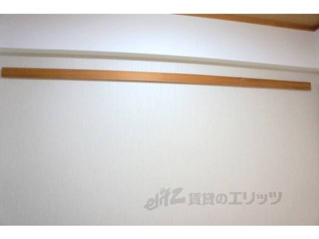 収納　衣紋掛け