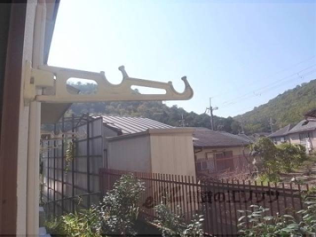 ベランダ 物干し竿掛け