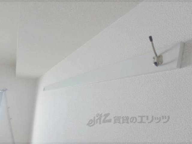服掛け