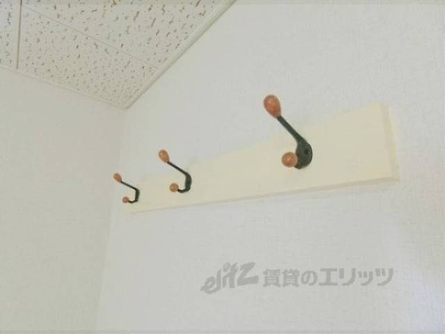 服掛け