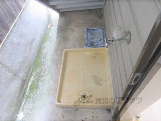 洗濯機置場　場所：共用廊下