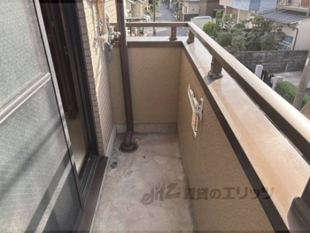 ベランダ　洗濯機置き場