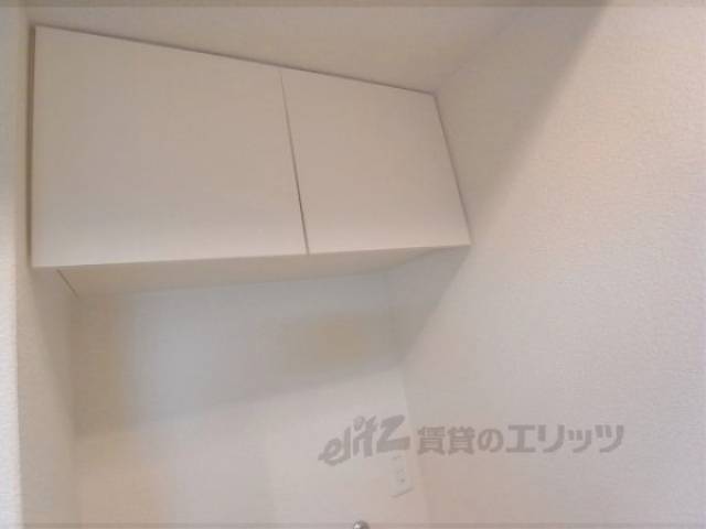 収納　洗濯機置場の上部にあります