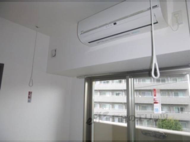 リビング　室内物干し竿掛け