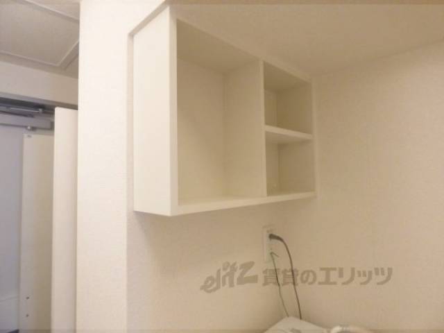 収納　洗濯機上部