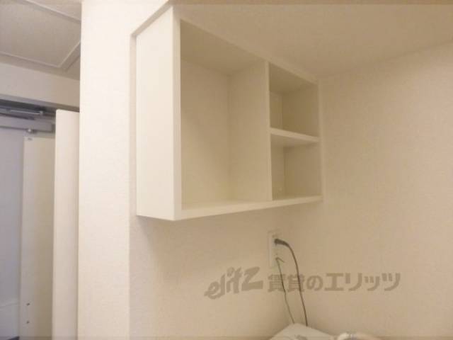 収納　洗濯機上部