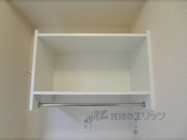 収納　洗濯機置場　上