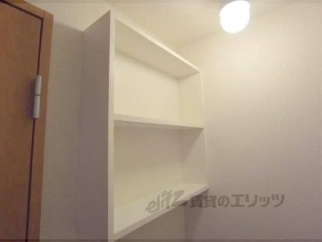 洗濯機上収納　。