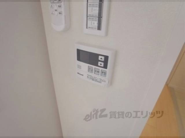 給湯器リモコン　給湯パネルで調節可能です