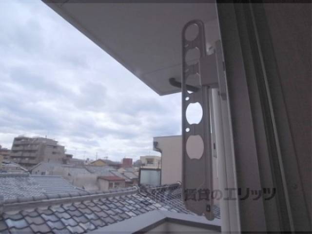 物干しざおかけ