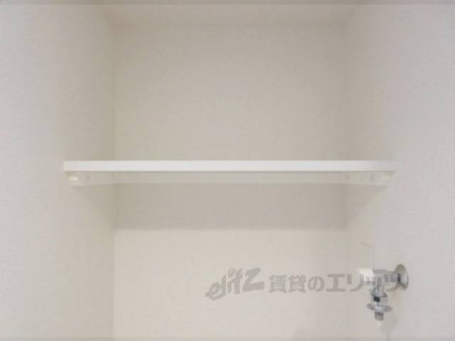 収納　洗濯機置き場上