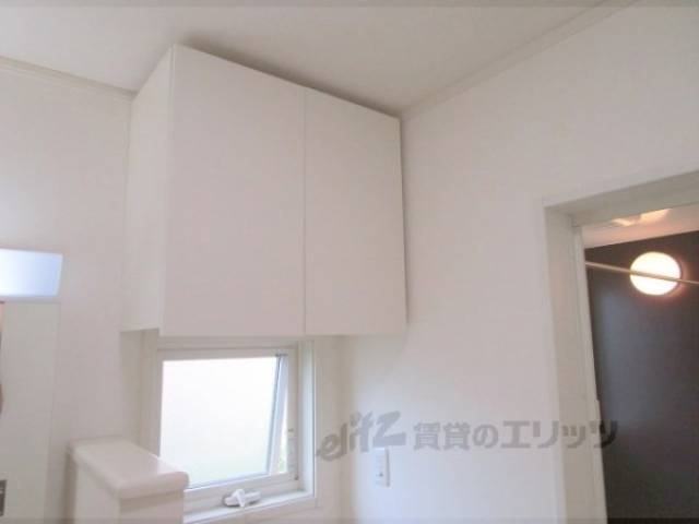 洗濯機置場　収納上部