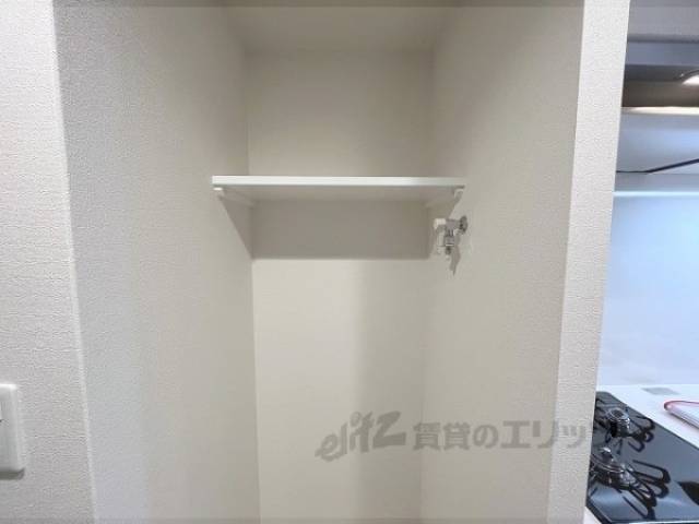 収納　洗濯機上