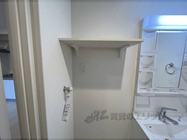 収納　洗濯機上