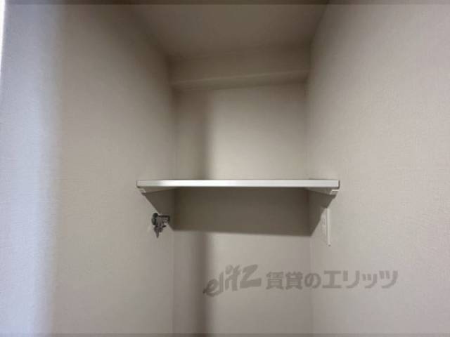 収納　洗濯機置き場上