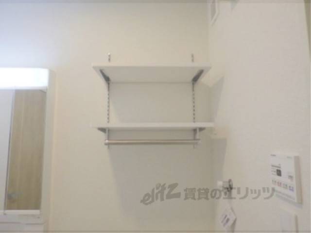 収納　洗濯機置き場上