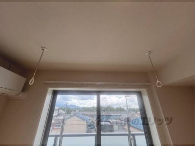 室内物干し竿掛け
