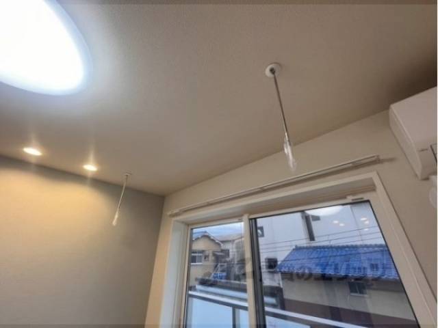 室内物干し竿掛け