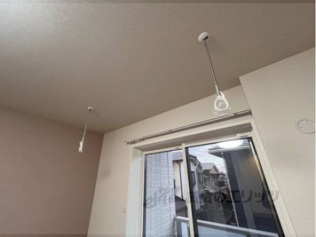 室内物干し竿掛け